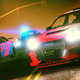 A group of colorfully painted street racers drive together at night, as seen in GTA Online.